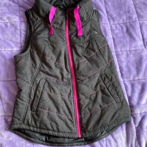 north face grey vest with hot pink zipper
